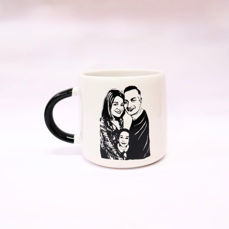 Black handle ceramic mug